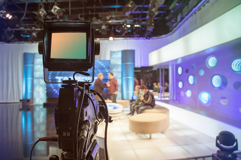 Television studio with camera and lights